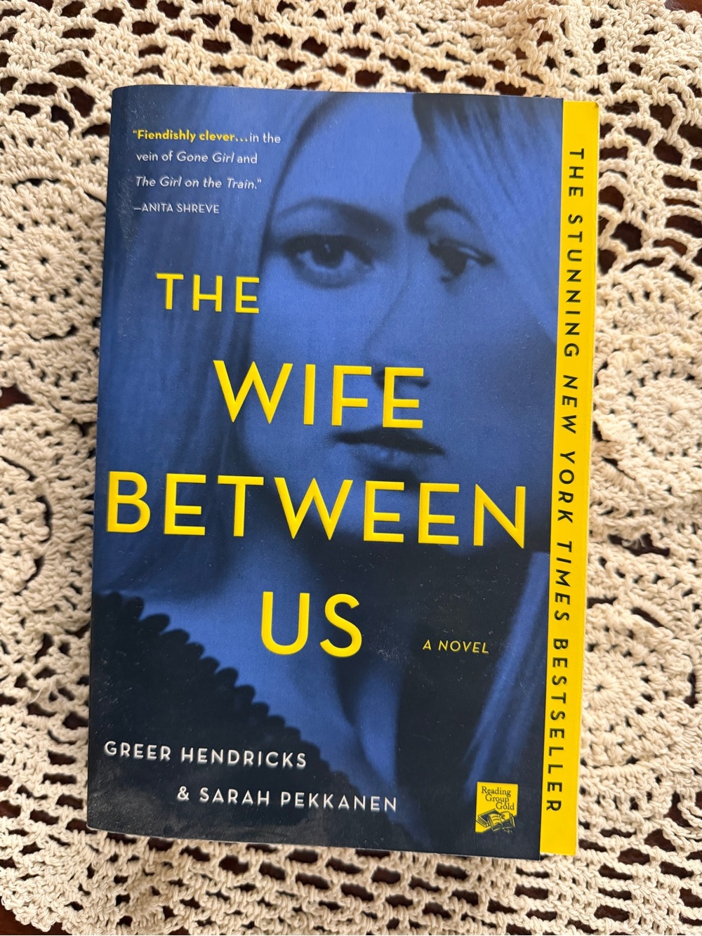 The Wife Between Us by Greer Hendricks & Sarah Pekkanen - Blue & Yellow Cover